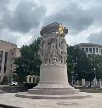 George Gordon Meade Memorial with sculpted figures, a golden emblem, and the name MEADE on the base.