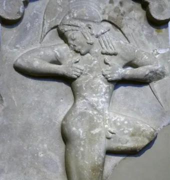 Ancient Greek relief showing a forward-leaning male runner in profile with bent arms.