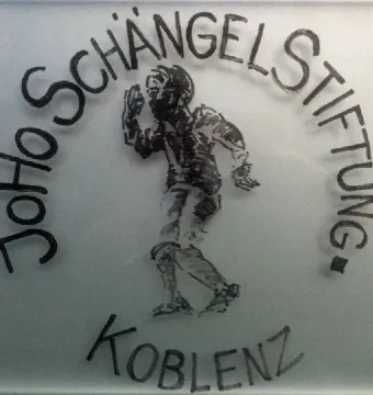 Frosted Schängel Stiftung sign in Koblenz with a boy etching and raised hand