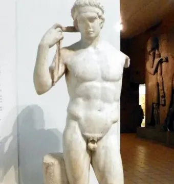 Farnese Diadumenos marble statue of a nude male athlete tying a band around his head