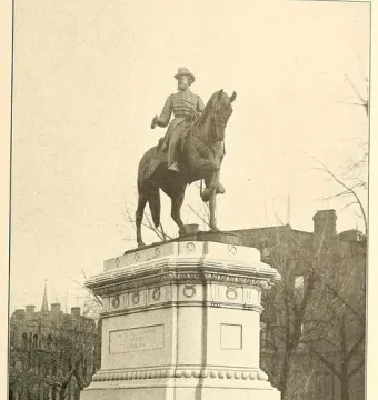 Major General James B. McPherson Memorial, an equestrian statue on a tall stone pedestal in a park setting