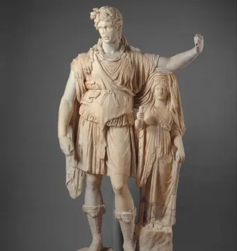 Hope Dionysus marble statue of a male figure leaning beside a draped female figure on a rocky support.