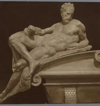 Michelangelo’s Evening, a reclining marble figure resting on one arm and holding drapery.
