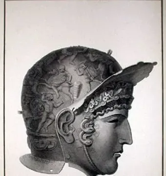 Ribchester Helmet in profile, showing a decorated face mask, elaborate curls, and a wing-like ornament at the front.