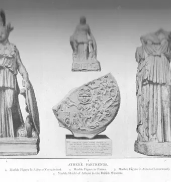 Varvakeion Athena stands draped with an ornate headdress, holding a small Nike and a shield.