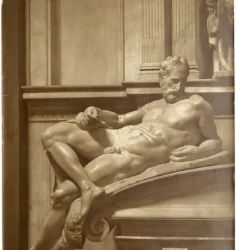 Michelangelo\'s Crepuscolo, a reclining nude marble figure with a beard beneath ornate architectural details.