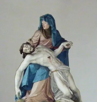 Nenningen Pietà showing a polychrome sculpture of Mary cradling the body of Christ across her lap