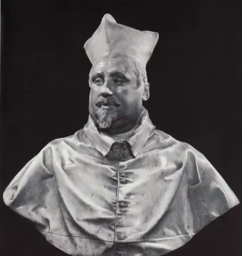 Marble bust of Cardinal Scipione Borghese wearing a clerical cap and buttoned robes.
