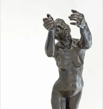 The Implorer bronze sculpture shows a kneeling nude figure with head tilted upward and both arms raised in supplication.