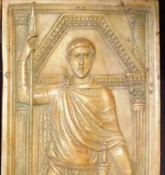 Carved plaque from the Diptych of Stilicho showing a standing Roman general holding a spear and shield.