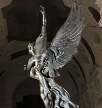 Gloria Victis bronze sculpture showing a winged figure carrying a limp warrior with an outstretched arm.