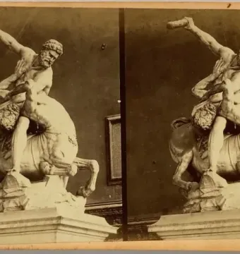 Marble sculpture of Heracles wrestling a centaur, with Heracles raising a club over the figure below him.