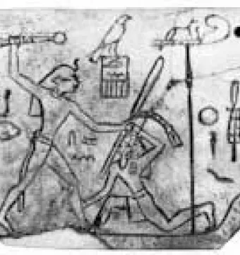 MacGregor plaque showing an ancient Egyptian relief of a standing figure raising a mace over a kneeling figure, with hieroglyphs and symbols around them.