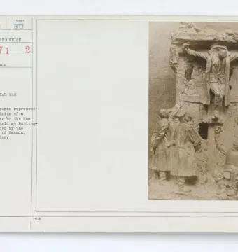 Canada\'s Golgotha bronze sculpture showing a Canadian soldier crucified on a wooden cross, with other uniformed figures standing below.