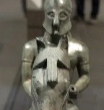 Armento Rider sculpture of a helmeted rider on a horse, shown frontally.