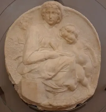Michelangelo’s Pitti Tondo relief showing the Madonna and Child with the young St. John.