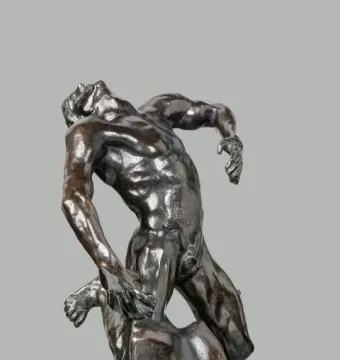 The Falling Man bronze sculpture shows a muscular male figure leaning backward with arms outstretched on a rocky base.