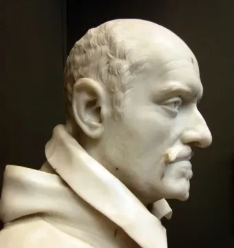 White marble bust of Cardinal Alessandro Peretti in profile against a dark background.