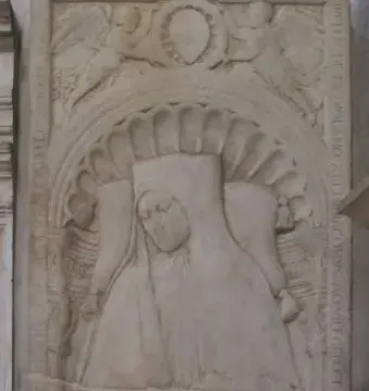Tomb of Giovanni Crivelli stone relief with a carved effigy beneath a scalloped arch and winged figures above.