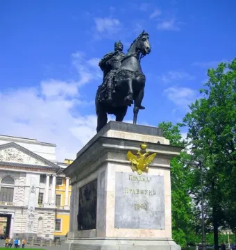 Monument to Peter I, a bronze equestrian statue on a tall stone pedestal with a double-headed eagle emblem.