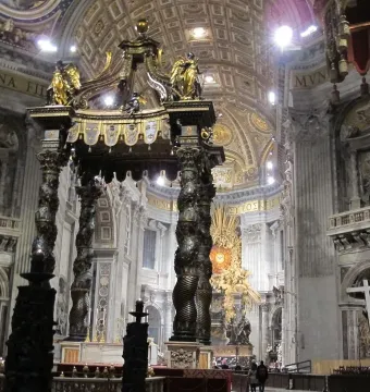 St. Peter\'s Baldachin beneath the grand dome of St. Peter\'s Basilica