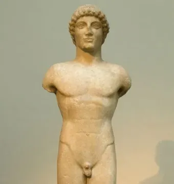 Apollo Strangford marble kouros statue with missing arms and lower legs, shown frontally on a dark base.