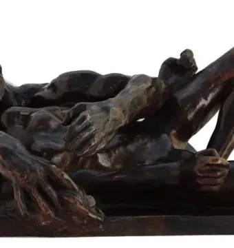 Avarice and Lust by Auguste Rodin, showing two intertwined figures on a rectangular base.