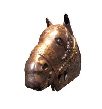 Sassanian horse head sculpture with ornate facial details and upright ears on a white background.