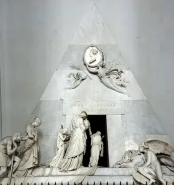 Cenotaph of Archduchess Maria Christina with a white marble pyramid-shaped monument and classical mourning figures.