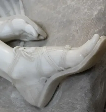 Close-up of Antonio Canova\'s Endymion Sleeping marble sculpture.
