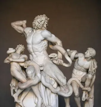 Laocoön and His Sons marble sculpture showing three figures entwined by serpents.