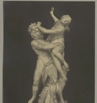 Marble sculpture of Pluto abducting Proserpina, with a multi-headed dog at the base.
