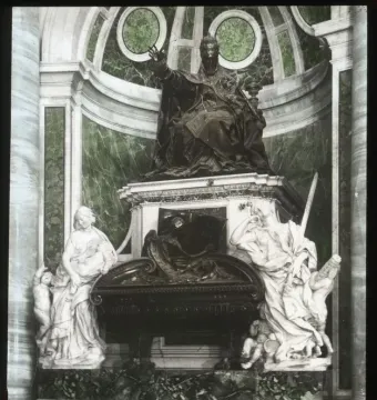 Tomb of Pope Urban VIII with a seated papal statue above an ornate sarcophagus, flanked by white marble allegorical figures.