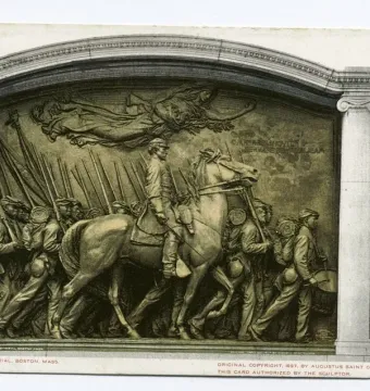 Shaw Memorial bronze relief with a mounted leader, marching soldiers, and a winged figure above them.