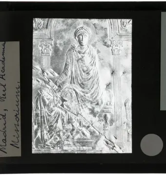 Detail of the Disc of Theodosius showing a seated crowned figure beneath an arched canopy flanked by columns.