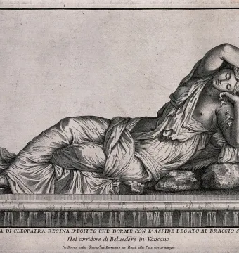 Sleeping Ariadne reclining on her side with draped clothing and one arm raised above her head.