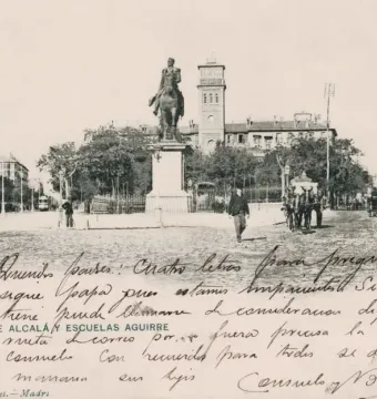 The General Espartero Monument stands on horseback in the center of a wide plaza, with buildings and trees in the background.