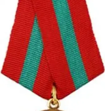 Bronze medal on a red ribbon with teal stripes, showing a mounted figure and Cyrillic text.
