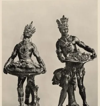 Moor with Emerald Plate, showing two crowned figures holding trays filled with crystalline material.