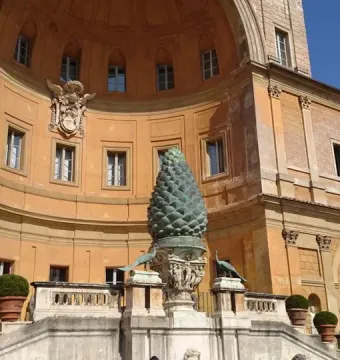 La Pigna pine cone sculpture with two peacocks in the Vatican Museums courtyard