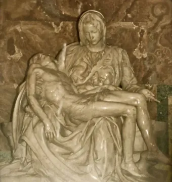 Michelangelo\'s Pietà, a marble sculpture of the Virgin Mary holding the body of Jesus across her lap.
