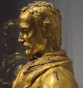 Saint Rossore Reliquary, gilded bronze bust of a bearded man in profile with curly hair and an ornate collar