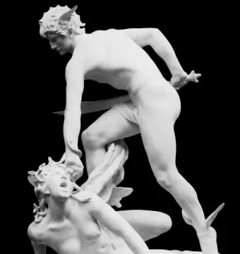Perseus and the Gorgon marble sculpture showing Perseus poised to strike Medusa, who lies prone with snakes in her hair and a sword raised.