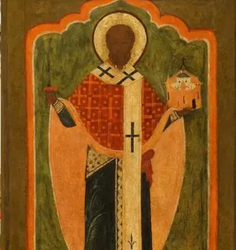 Saint Nicholas of Mozhaysk icon showing a haloed saint holding a sword and a small building model.