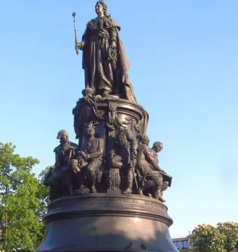 Catherine II Monument with a tall bronze statue and surrounding figures on a tiered pedestal.