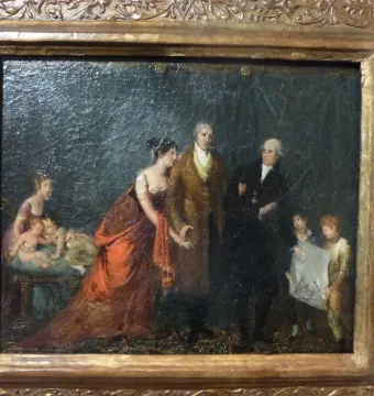 Framed oil painting showing several figures, including women, children, and two men, in a dark interior.