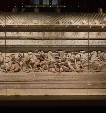 Alexander Sarcophagus with a carved battle relief and sculpted figures on the lid
