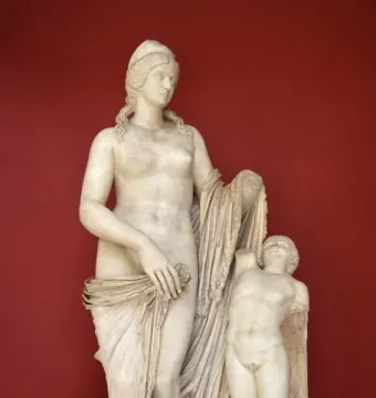 Venus Felix marble statue with a draped female figure and a small winged child figure beside her.
