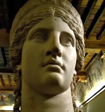 Juno Ludovisi marble bust of a female head with braided hair and a calm expression