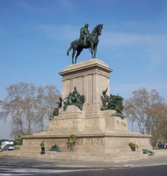 Giuseppe Garibaldi equestrian monument on a stone pedestal with bronze reliefs and sculptures in Rome.